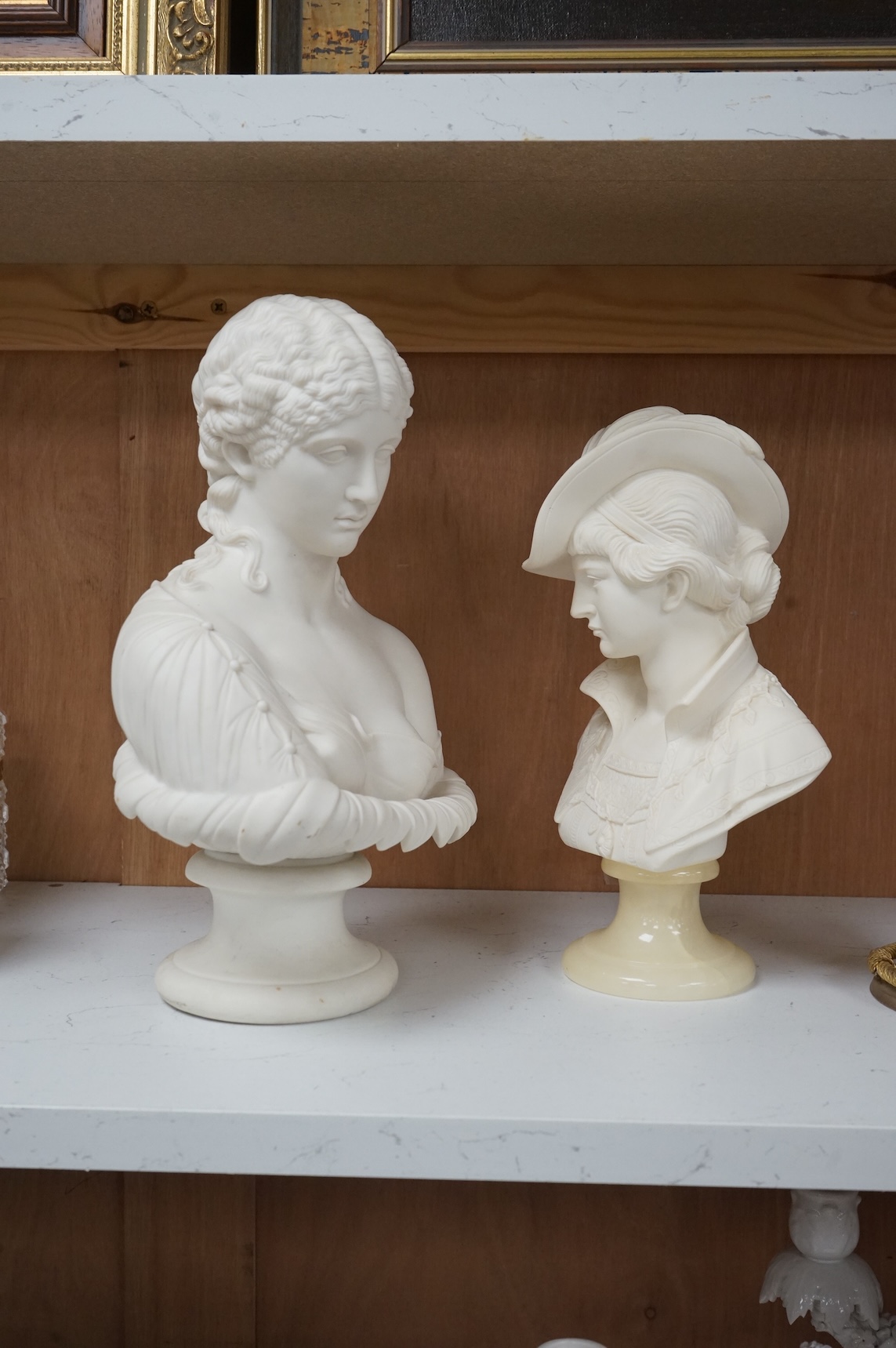 A 19th century Parian classical bust, Clytie, together with a modern Italian bust, tallest 29cm high.